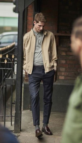 Tan Bomber Jacket Outfits For Men: This laid-back combo of a tan bomber jacket and navy chinos is a goofproof option when you need to look laid-back and cool but have no time to dress up. If you want to effortlessly lift up your outfit with one single piece, why not throw in a pair of burgundy leather loafers?