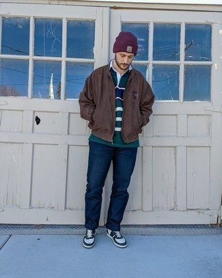 Violet Beanie Outfits For Men: A dark brown bomber jacket and a violet beanie combined together are a great match. White and navy leather high top sneakers are the most effective way to transform your ensemble.