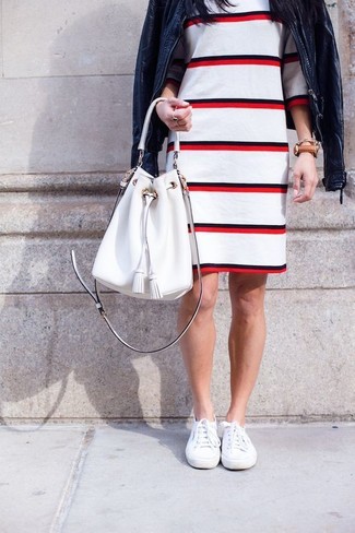 White Plimsolls Outfits For Women: The formula for laid-back style? A navy leather bomber jacket with a white and red horizontal striped sheath dress. For something more on the cool and laid-back end to complete this ensemble, complement this look with a pair of white plimsolls.