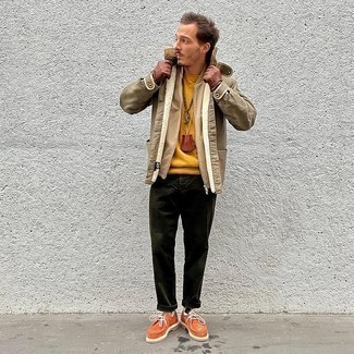 Dark Green Chinos Outfits: To don a casual outfit with a fashionable spin, you can go for a tan bomber jacket and dark green chinos. Our favorite of a great number of ways to complement this outfit is orange suede desert boots.