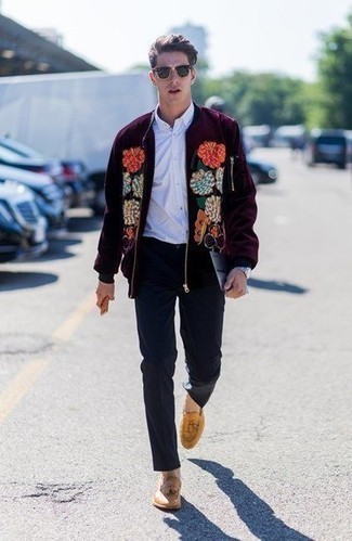 Burgundy Embroidered Bomber Jacket Outfits For Men: Team a burgundy embroidered bomber jacket with navy chinos for both on-trend and easy-to-style outfit. To add some extra fanciness to this ensemble, enter tan leather tassel loafers into the equation.
