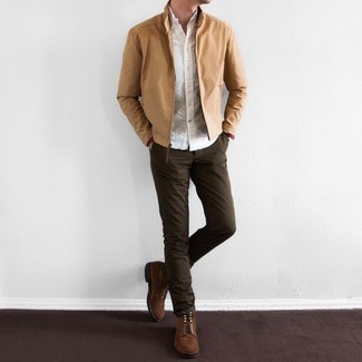 Tan Bomber Jacket Outfits For Men: This pairing of a tan bomber jacket and dark brown chinos is a safe bet for an utterly cool ensemble. Not sure how to round off your outfit? Finish off with brown suede casual boots to dress it up.