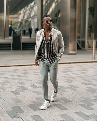 Black Short Sleeve Shirt Outfits For Men: The go-to for a kick-ass off-duty look for men? A black short sleeve shirt with grey chinos. Complement this getup with white and black canvas low top sneakers and the whole outfit will come together.
