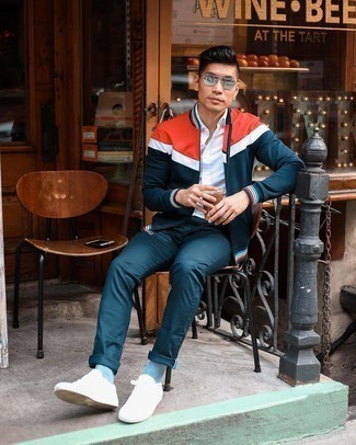 Multi colored Jacket Outfits For Men: Make a multi colored jacket and navy chinos your outfit choice for a laid-back kind of sophistication. If you need to effortlessly dial down this outfit with a pair of shoes, why not introduce white canvas low top sneakers to the equation?