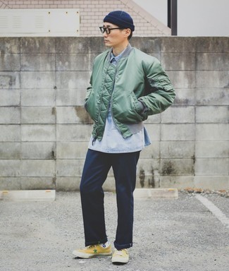 Mint Bomber Jacket Outfits For Men: For a casual and cool look, consider pairing a mint bomber jacket with navy chinos — these items work beautifully together. A pair of mustard canvas low top sneakers instantly ramps up the cool of this outfit.