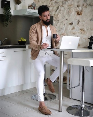Beige Suede Driving Shoes Outfits For Men: This pairing of a tan suede bomber jacket and white chinos is a safe go-to for an utterly dapper outfit. All you need is a good pair of beige suede driving shoes to finish this ensemble.