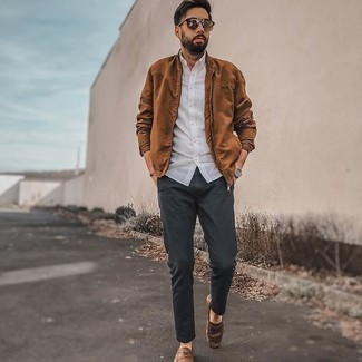 Brown Bomber Jacket Outfits For Men: Pairing a brown bomber jacket with charcoal chinos is an on-point pick for a casual yet stylish look. Look at how nice this ensemble goes with brown leather driving shoes.