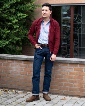 Red Jacket Outfits For Men: To put together a laid-back ensemble with a modern spin, try teaming a red jacket with navy jeans. Finishing with dark brown suede chelsea boots is an effective way to give an added touch of style to your ensemble.