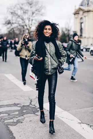 Teal Bomber Jacket Outfits For Women: This pairing of a teal bomber jacket and black leather skinny pants is a nice getup for off duty. If you wish to effortlessly step up your getup with a pair of shoes, complement your ensemble with black leather ankle boots.