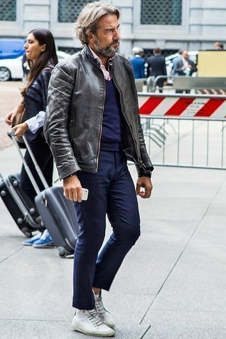 Grey Bomber Jacket Outfits For Men: Such items as a grey bomber jacket and navy chinos are an easy way to introduce extra cool into your off-duty styling collection. Feeling experimental today? Change up this outfit by wearing a pair of white leather high top sneakers.