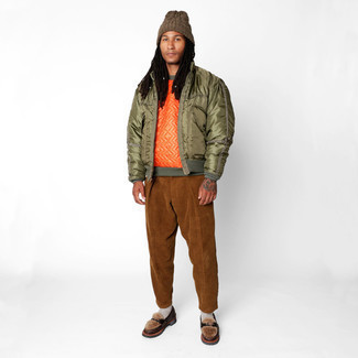 Orange Sweatshirt Outfits For Men: Show off your credentials in menswear styling in this casual pairing of an orange sweatshirt and brown corduroy chinos. And if you need to easily dress up your outfit with one piece, why not complement your ensemble with a pair of dark brown leather loafers?