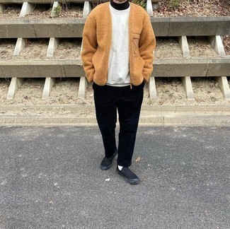 White Sweatshirt Outfits For Men: Flaunt that you know a thing or two about menswear in a white sweatshirt and black chinos. All you need is a cool pair of black canvas slip-on sneakers to round off this getup.