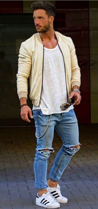 Mustard Jacket Outfits For Men: Choose a mustard jacket and blue ripped skinny jeans for head-to-toe comfort dressing. Here's how to play it up: white leather low top sneakers.