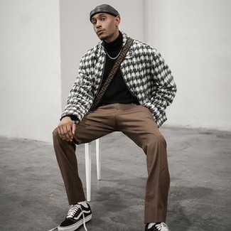 Men's Black and White Houndstooth Bomber Jacket, Black Turtleneck, Brown Chinos, Black and White Canvas Low Top Sneakers