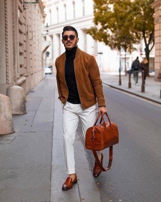 Tobacco Leather Loafers Outfits For Men: Team a brown suede bomber jacket with white chinos to pull together an interesting and current relaxed casual ensemble. A trendy pair of tobacco leather loafers is an easy way to add a little kick to the look.