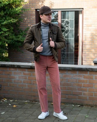 Dark Brown Baseball Cap Outfits For Men: Parade your chops in men's fashion by opting for this contemporary pairing of a dark brown bomber jacket and a dark brown baseball cap. Rounding off with white canvas low top sneakers is a surefire way to bring an air of sophistication to your outfit.