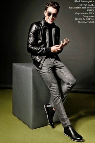 Black Leather Bomber Jacket Outfits For Men: This combination of a black leather bomber jacket and grey wool dress pants comes in useful when you need to look like a British gentleman. If not sure about the footwear, introduce a pair of black leather chelsea boots to your ensemble.