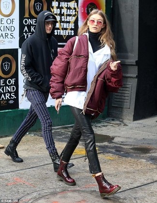 Burgundy Bomber Jacket Outfits For Women: This pairing of a burgundy bomber jacket and black leather skinny pants is seriously chic and yet it looks relaxed enough and ready for anything. Complete this ensemble with a pair of burgundy leather lace-up flat boots to add a sense of casualness to this look.