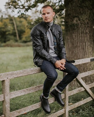 Black Leather Bomber Jacket Outfits For Men: A black leather bomber jacket and navy jeans are the kind of a fail-safe casual look that you so desperately need when you have zero time to dress up. Get a bit experimental with shoes and spruce up this getup by finishing with a pair of black leather chelsea boots.