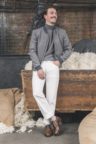 Grey Wool Bomber Jacket Outfits For Men: This pairing of a grey wool bomber jacket and white jeans is a safe bet for an absolutely dapper ensemble. Dark brown leather derby shoes are a fail-safe way to give an added dose of style to this ensemble.