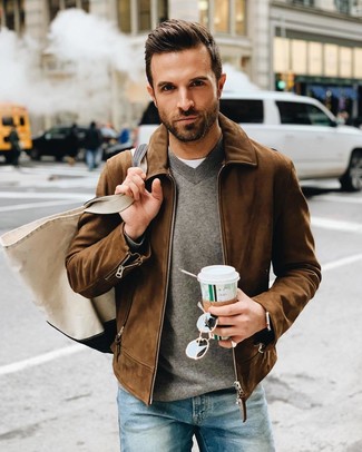 Dark Brown Suede Bomber Jacket Outfits For Men: A dark brown suede bomber jacket and blue jeans are the kind of a no-brainer casual ensemble that you need when you have zero time to spare.