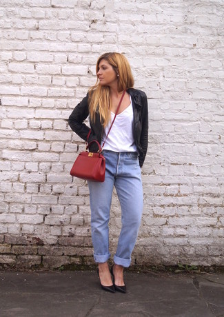 Light Blue Boyfriend Jeans Outfits: If the situation permits a casual ensemble, you can rock a black leather bomber jacket and light blue boyfriend jeans. Complement this outfit with a pair of black leather pumps for an added touch of style.