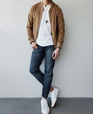 Tan Bomber Jacket Outfits For Men: Consider teaming a tan bomber jacket with navy jeans to create an incredibly dapper and modern-looking off-duty outfit. If you're clueless about how to finish, grab a pair of white leather low top sneakers.