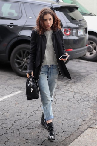 Lily Collins wearing Black Leather Lace-up Ankle Boots, Light Blue Ripped Boyfriend Jeans, Grey Crew-neck Sweater, Black Coat