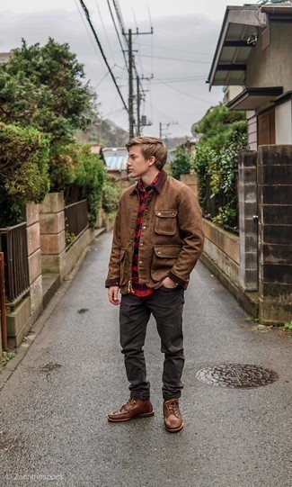 Dark Brown Jeans Outfits For Men: The combo of a brown barn jacket and dark brown jeans makes this a solid relaxed casual getup. If not sure as to what to wear on the shoe front, stick to brown leather desert boots.
