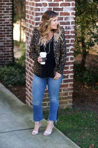 Brown Leopard Blazer Outfits For Women: For relaxed dressing with a twist, you can opt for a brown leopard blazer and blue jeans. Go the extra mile and shake up your look by wearing a pair of beige leather heeled sandals.