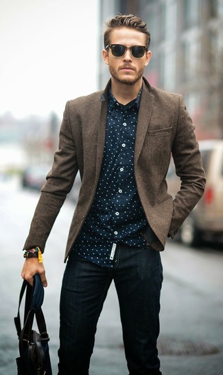 For a look that's casually sleek and wow-worthy, consider pairing a brown wool blazer with black jeans.