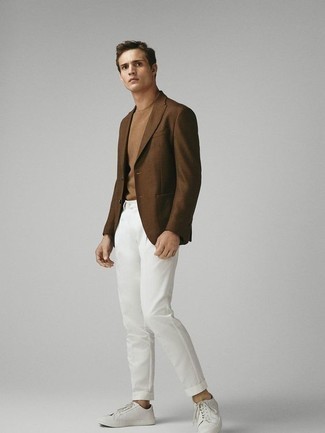 Beige Crew-neck T-shirt with White Low Top Sneakers Outfits For Men: You'll be amazed at how easy it is for any gent to get dressed like this. Just a beige crew-neck t-shirt paired with white chinos. A pair of white low top sneakers acts as the glue that ties this look together.