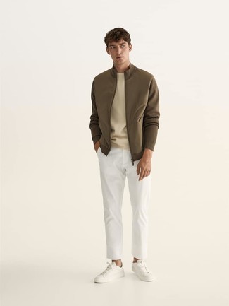 Tobacco Bomber Jacket with White Chinos Outfits In Their 20s: A tobacco bomber jacket and white chinos are a nice outfit to carry you throughout the day and into the night. For something more on the daring side to complement your look, complete this outfit with white canvas low top sneakers. Those wondering how to rock cool casual outfits in your mid-20s, this combination should answer your question.