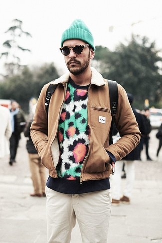 Green Beanie Outfits For Men: If you like relaxed dressing, marry a brown bomber jacket with a green beanie.