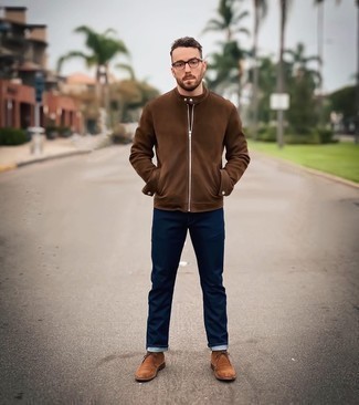 Brown Bomber Jacket Outfits For Men: Pairing a brown bomber jacket with navy jeans is a nice option for a casually stylish outfit. Complete this look with tan suede desert boots for maximum style.