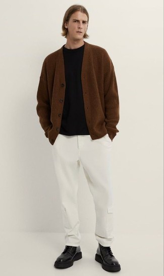 Brown Knit Cardigan Outfits For Men: Team a brown knit cardigan with white cargo pants to put together a really dapper and current off-duty ensemble. A good pair of black leather work boots is an easy way to upgrade your getup.