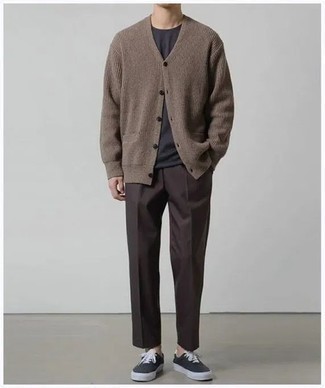 Brown Knit Cardigan Outfits For Men: For effortless style without the need to sacrifice on functionality, we turn to this combo of a brown knit cardigan and dark brown chinos. Infuse a mellow touch into this outfit by slipping into black canvas low top sneakers.