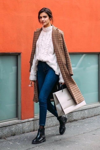Tobacco Check Coat Outfits For Women: This combination of a tobacco check coat and blue skinny jeans will allow you to flaunt your sartorial chops even on dress-down days. For a more laid-back vibe, add black embellished leather chelsea boots to the equation.