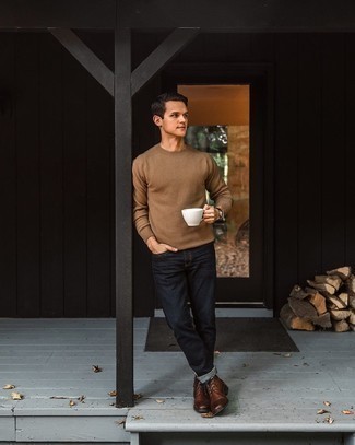 Brown Crew-neck Sweater Outfits For Men: Make a brown crew-neck sweater and navy jeans your outfit choice to create an extra sharp and modern-looking relaxed ensemble. A pair of dark brown leather desert boots can integrate well within a great deal of looks.