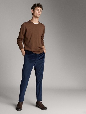 Tobacco Crew-neck Sweater Outfits For Men: The combo of a tobacco crew-neck sweater and navy corduroy chinos makes this a solid casual look. Dark brown leather chelsea boots will add a more elegant twist to an otherwise mostly casual outfit.