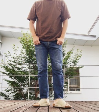 Brown Crew-neck T-shirt Outfits For Men: This combo of a brown crew-neck t-shirt and navy jeans is a safe go-to for an effortlessly stylish look. Rev up your whole outfit by finishing with a pair of beige suede sandals.