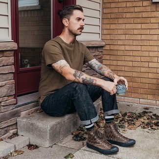 Brown Print Canvas High Top Sneakers Outfits For Men: A brown crew-neck t-shirt and navy jeans are a good combination to carry you throughout the day. Dial up the cool of your outfit by rocking a pair of brown print canvas high top sneakers.