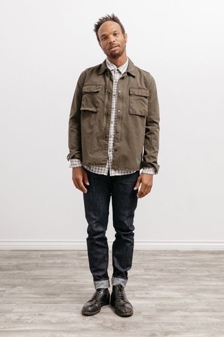 Grey Gingham Long Sleeve Shirt Outfits For Men: Consider wearing a grey gingham long sleeve shirt and charcoal jeans if you seek to look casually dapper without putting in too much time. To give your overall ensemble a more elegant vibe, why not introduce dark brown leather casual boots to this outfit?
