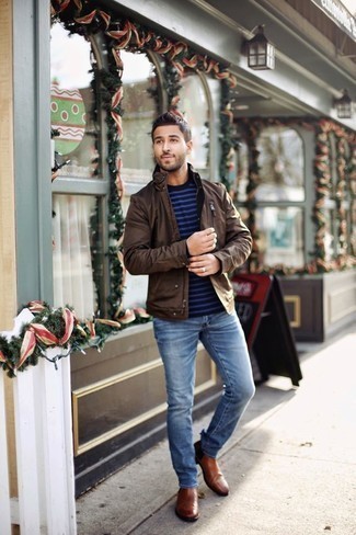 Men's Brown Leather Field Jacket, Navy Horizontal Striped Long Sleeve T-Shirt, Light Blue Jeans, Brown Leather Chelsea Boots