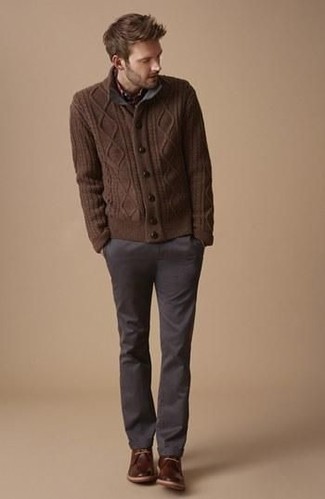 Knit Cardigan Outfits For Men: A knit cardigan and charcoal chinos are the kind of a fail-safe casual outfit that you so desperately need when you have no extra time. Dark brown leather desert boots will be the perfect complement to your outfit.