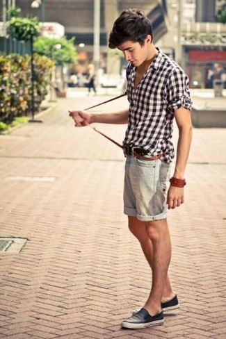 Brown Gingham Long Sleeve Shirt Outfits For Men: This casual combination of a brown gingham long sleeve shirt and grey denim shorts couldn't possibly come across other than devastatingly dapper. Complement this ensemble with black leather slip-on sneakers et voila, the look is complete.