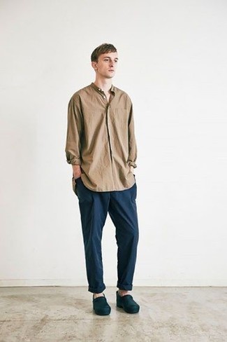Brown Long Sleeve Shirt Outfits For Men: This off-duty combo of a brown long sleeve shirt and navy chinos is a foolproof option when you need to look casually dapper in a flash. A pair of navy rubber loafers instantly spruces up any look.