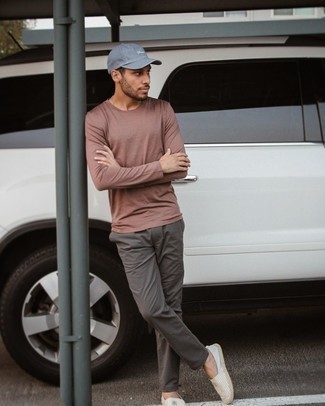 Light Blue Baseball Cap Outfits For Men: A brown long sleeve t-shirt and a light blue baseball cap are a good combination to have in your casual repertoire. Put a sleeker spin on an otherwise simple look by rocking a pair of white horizontal striped canvas espadrilles.