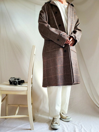 Brown Plaid Coat Outfits For Men: A brown plaid coat and white chinos are an easy way to inject an air of masculine elegance into your off-duty routine. Clueless about how to round off this look? Wear a pair of tan canvas low top sneakers to polish it off.