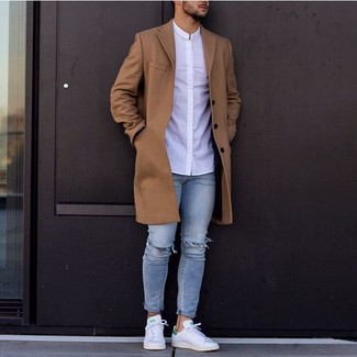 White Dress Shirt Casual Outfits For Men: Combining a white dress shirt with light blue ripped skinny jeans is a nice choice for a laid-back getup. Our favorite of an endless number of ways to round off this look is white leather low top sneakers.